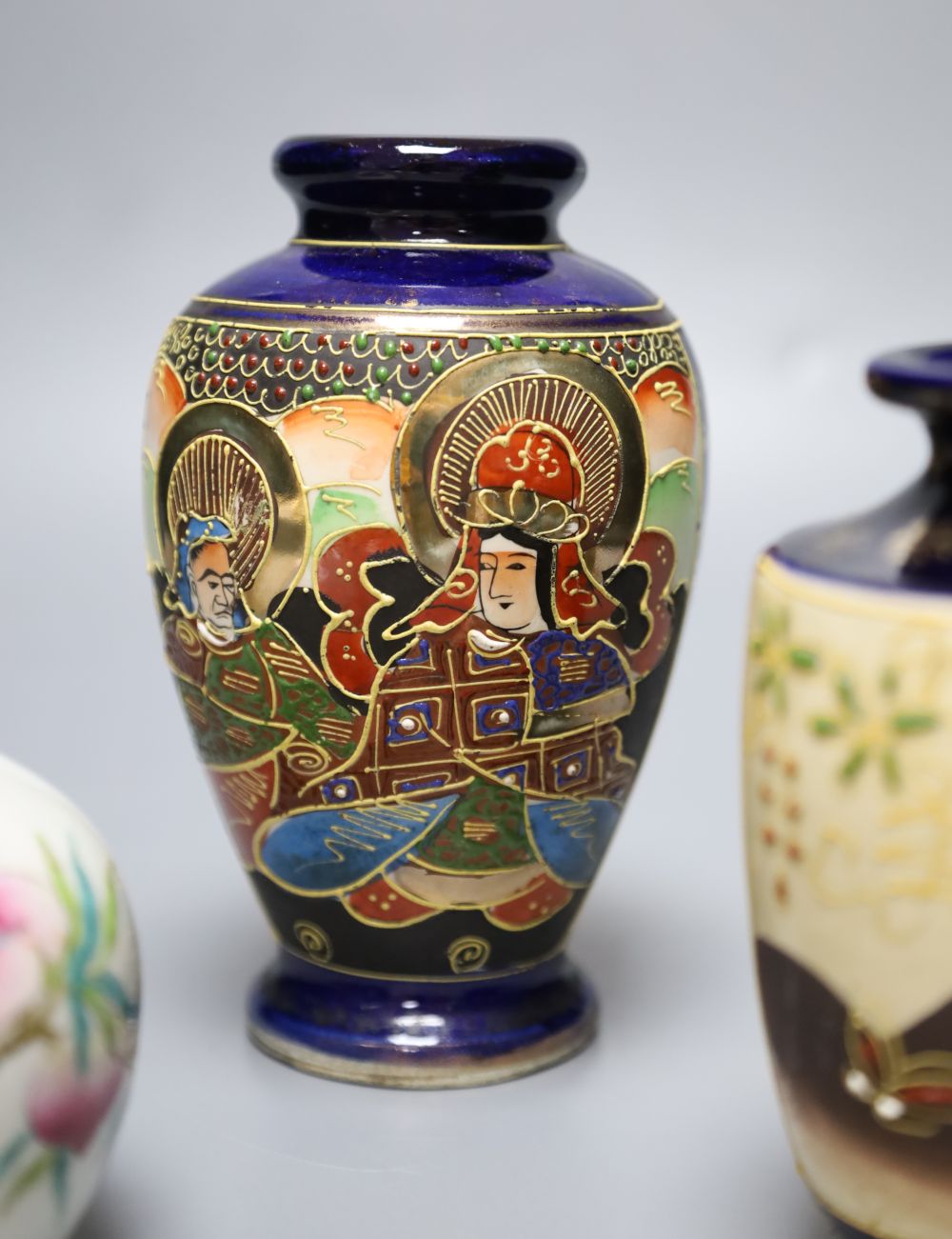 A Chinese famille rose jar, 9cm and two Satsuma enamelled jars